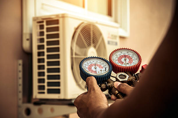 Professional Ductwork Repair technician working in Armington, IL